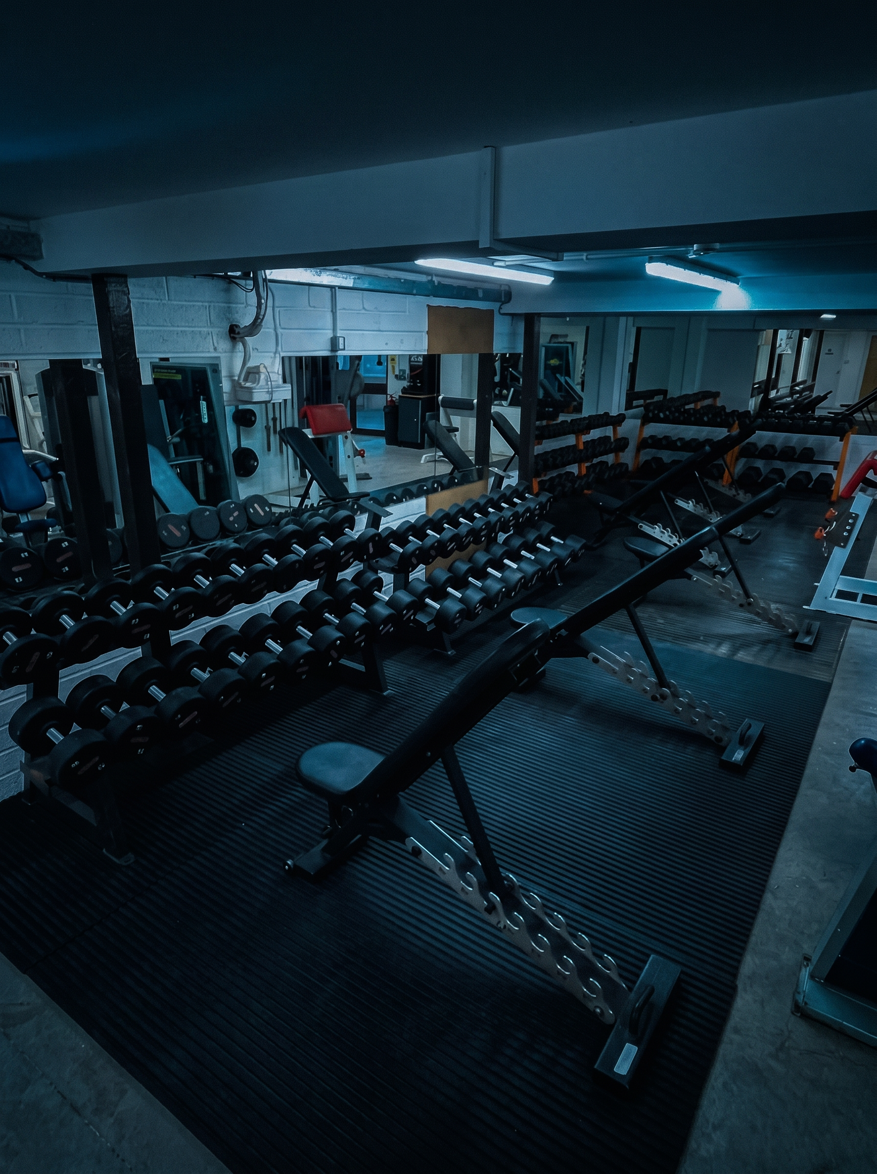 Dumbbell rack and free-weight area at Midnight Gym in Wells